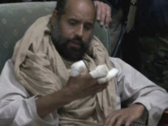 Сын Каддафи выступил по телевидению из тюремной камеры