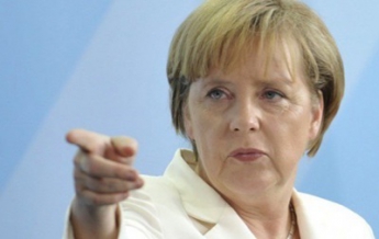 Меркель пригрозила Путину новыми санкциями