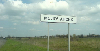 Жуткое убийство в Молочанске: труп в канаве на перекрестке улиц, топор, нож и детские санки