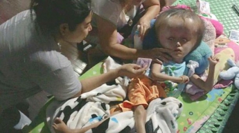 Жестокая судьба: родители бросили больного сына умирать (фото, видео)