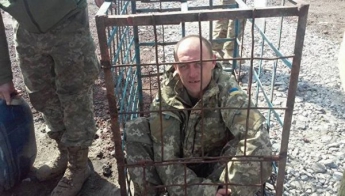 Под Харьковом бойцов ВСУ наказывали, запирая в клетки: обнародованы шокирующие фото