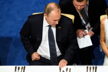 А Путин-то лысый! Фотографы с G20 "застали" главу Кремля во всей красе (фото)