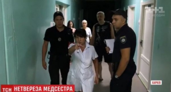 В Харькове пьяная медсестра оскорбляла детей и таскала их за волосы (видео)