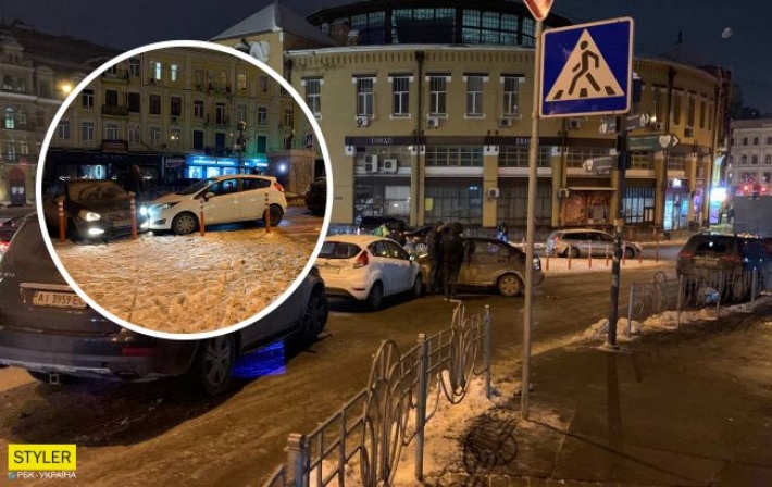 В центре Киева прорванный водопровод превратил улицу в каток: авто шли на таран (фото)