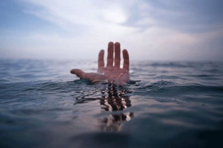 В харьковской реке найдено тело человека, фото: "К рукам были привязаны шлакоблоки"