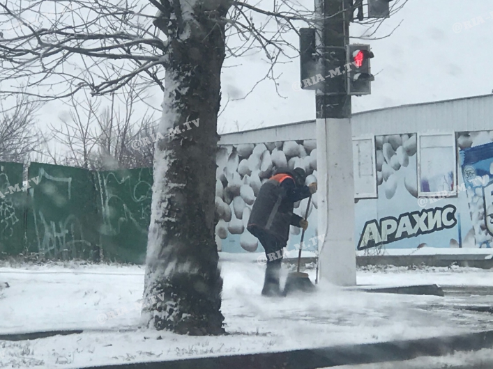 Город чистят от снега