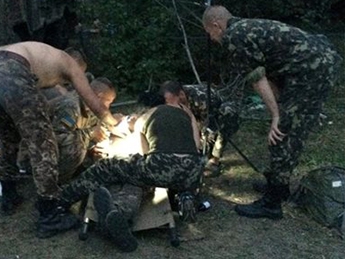 Прорыв окружения: 75 раненых бойцов в Мариновке спасали в тайне от руководства АТО (фото, видео)