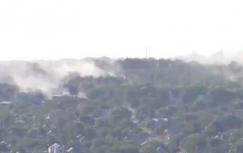 В Луганске дымят жилые кварталы (видео)