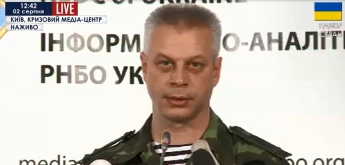 СНБО: В 5 км от украинской границы замечены около 1000 российских военных, 12 танков и 52 БТР