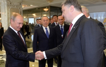 Порошенко и Путин договорились о прекращении огня