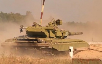 Танковые подразделения Нацгвардии завершают подготовку на полигоне (видео)