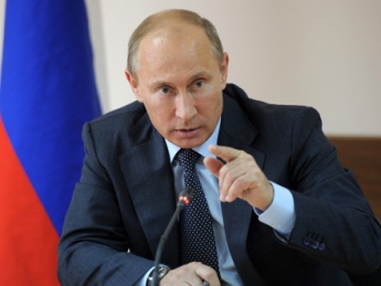 В.Путин подписал закон о запрете финансирования партий из-за границы