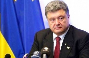 Президент Украины осудил теракт в Париже и высказал соболезнования семьям погибших