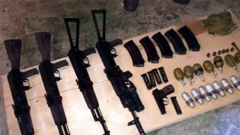 В Мариуполе нашли гараж с огромным хранилищем оружия (фото)