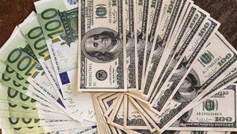 Нацбанк понизил курс гривны относительно доллара