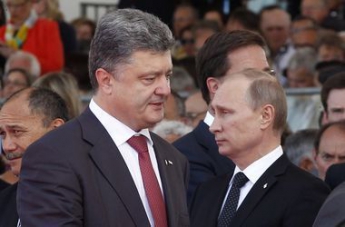 Порошенко потребовал от Путина выполнения минских договоренностей