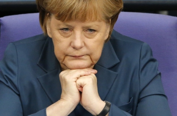 Меркель: Суть Минского соглашения - в проведении выборов в Донецкой и Луганской областях
