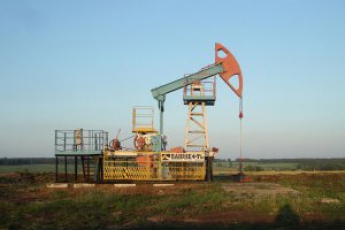 Низкие цены на нефть могут вынудить Россию сократить добычу - глава "Роснефти"