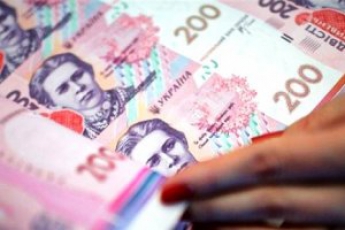 НБУ опустил официальный курс гривни ниже 30 грн/доллар