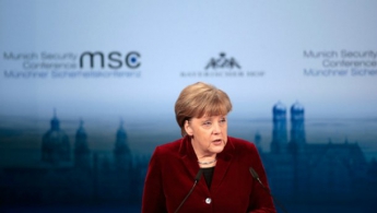 Меркель назвала убийство Немцова "подлым"