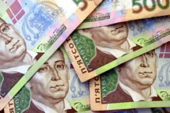 Официальный курс гривни укрепился к доллару на 90 копеек