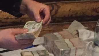 В Киевской области задержали чиновников за взятку в 600 тысяч долларов (фото)