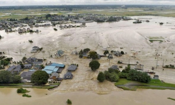 Наводнение в Японии: Эвакуировано более 90 тыс. человек (фото)