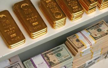 Нацбанк повысил официальный курс золота и палладия