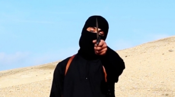 ИГИЛ распространил видео с казнью "британских шпионов" и посланием премьеру Кэмерону