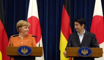 Меркель предлагала премьер-министру Японии лоббировать вступление его страны в НАТО