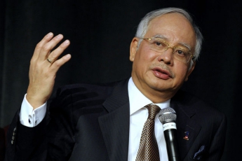 Премьер-министр Малайзии призвал родственников жертв катастрофы МН17 "набраться терпения"
