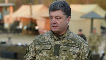 Порошенко поручил привести в усиленную боеготовность все силы на границе с Крымом и на Донбассе