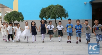 В Китае семь пар близнецов будут учиться в одном классе
