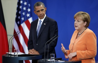 Обама и Меркель решительно осудили "варварские" удары РФ и армии Асада по Алеппо