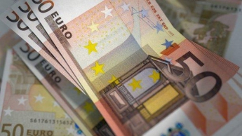 Евро резко упал к доллару после итальянского референдума