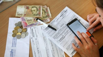 Долги за коммуналку: в Украине хотят автоматически снимать деньги с банковских карт
