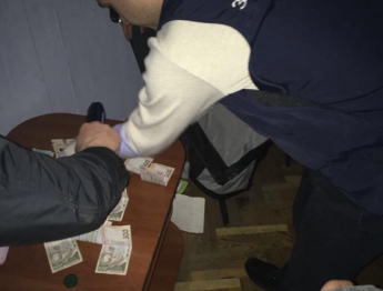 Громкое задержание в Запорожской области - на взятке взяли чиновников РГА (фото)