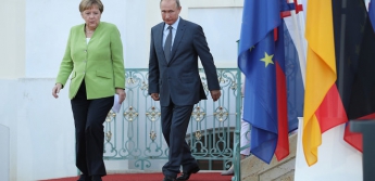 Кремль: Встреча Путина и Меркель нужна была для "сверки часов"