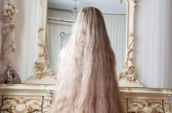 Одесситка не стригла волосы 28 лет: они отросли почти до двух метров. Фото