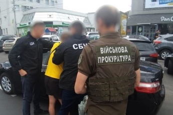 Полицейского поймали на взятке в 200 тысяч гривен в Виннице