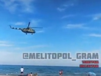 В Кирилловке с вертолета ищут людей без масок - отдыхающие развлекаются (видео)