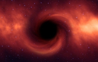 Ученые впервые поймали сигнал самой дальней черной дыры (фото)