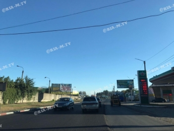 В Мелитополе затруднено движение - дорожники укладывают асфальт (фото, видео)