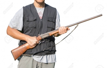 В Запорожье мужчина угрожал прохожим оружием (фото)