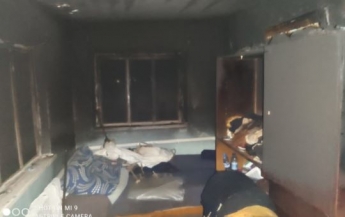 В Кривом Роге при пожаре в доме пострадали дети, фото