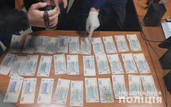 Начальник исполнительной службы в Запорожье требовал взятку 16 тысяч грн. за снятие ареста с имущества (фото)