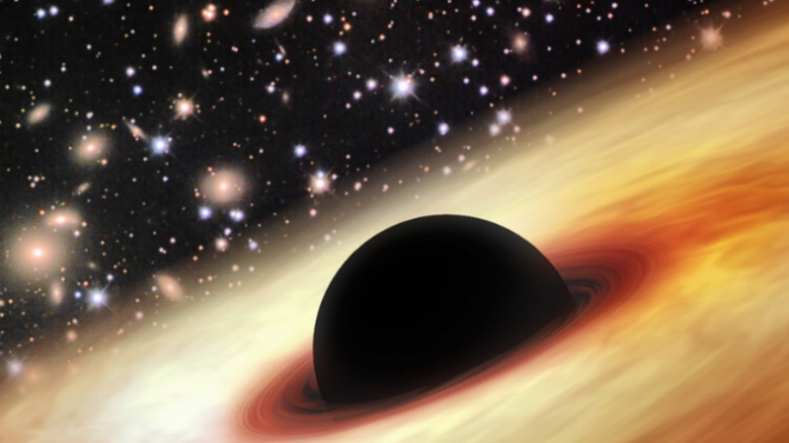 Ученые сделали уникальное фото черной дыры - она больше, чем наша Солнечная система