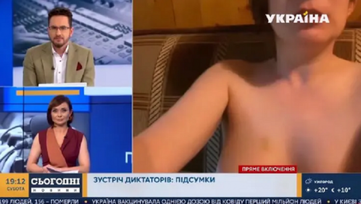 Голая девушка попала в кадр в прямом эфире украинского канала во время включения редактора "Дождя". Видео