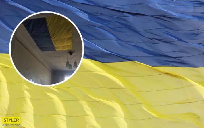 Чиновники в Николаеве "залатали" дыру в потолке государственным флагом Украины (фото)