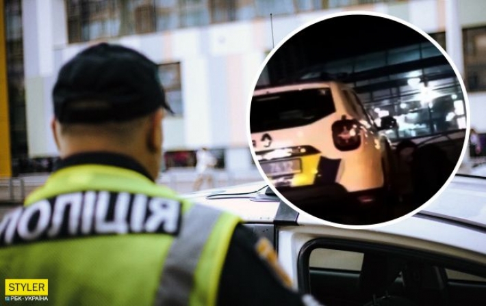 В Киеве тиктокер решил украсть колпачки из полицейского авто (видео)